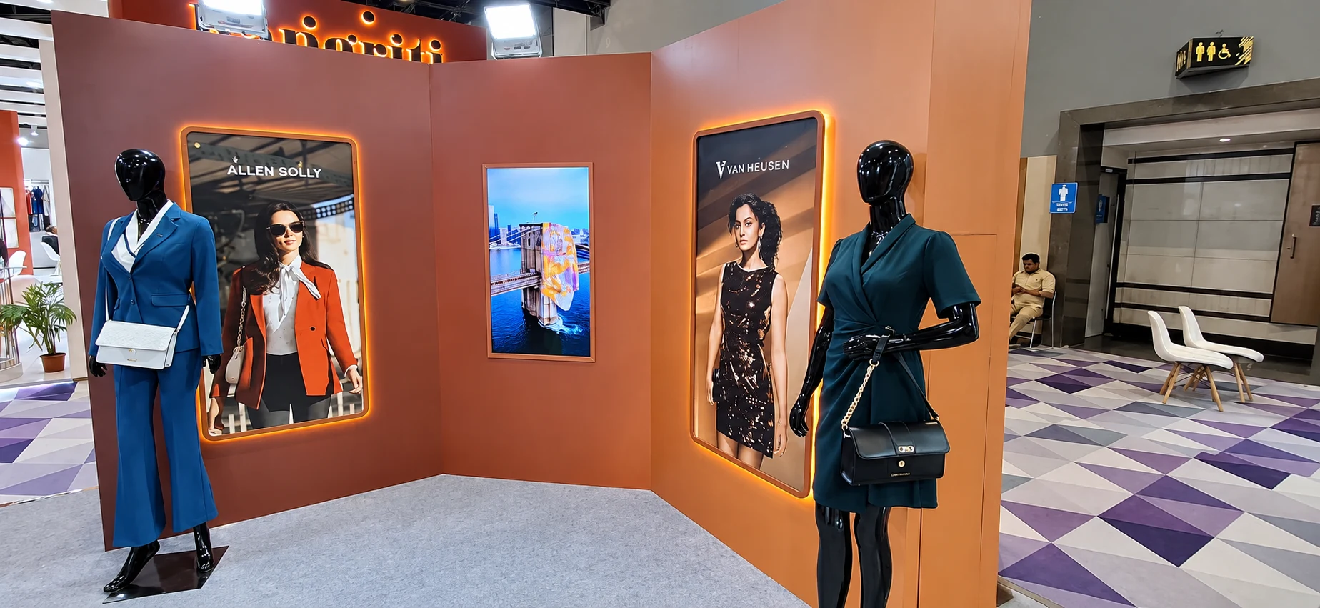 Allen Solly and Van Heusen frames with styled mannequins at the pavilion