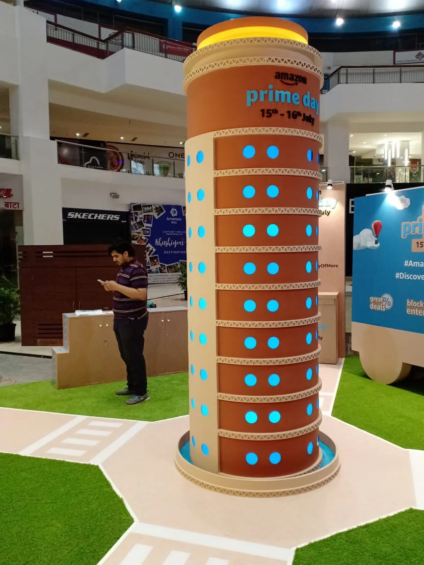 Amazon Prime Day tower installation glowing with blue dots inside the mall atrium