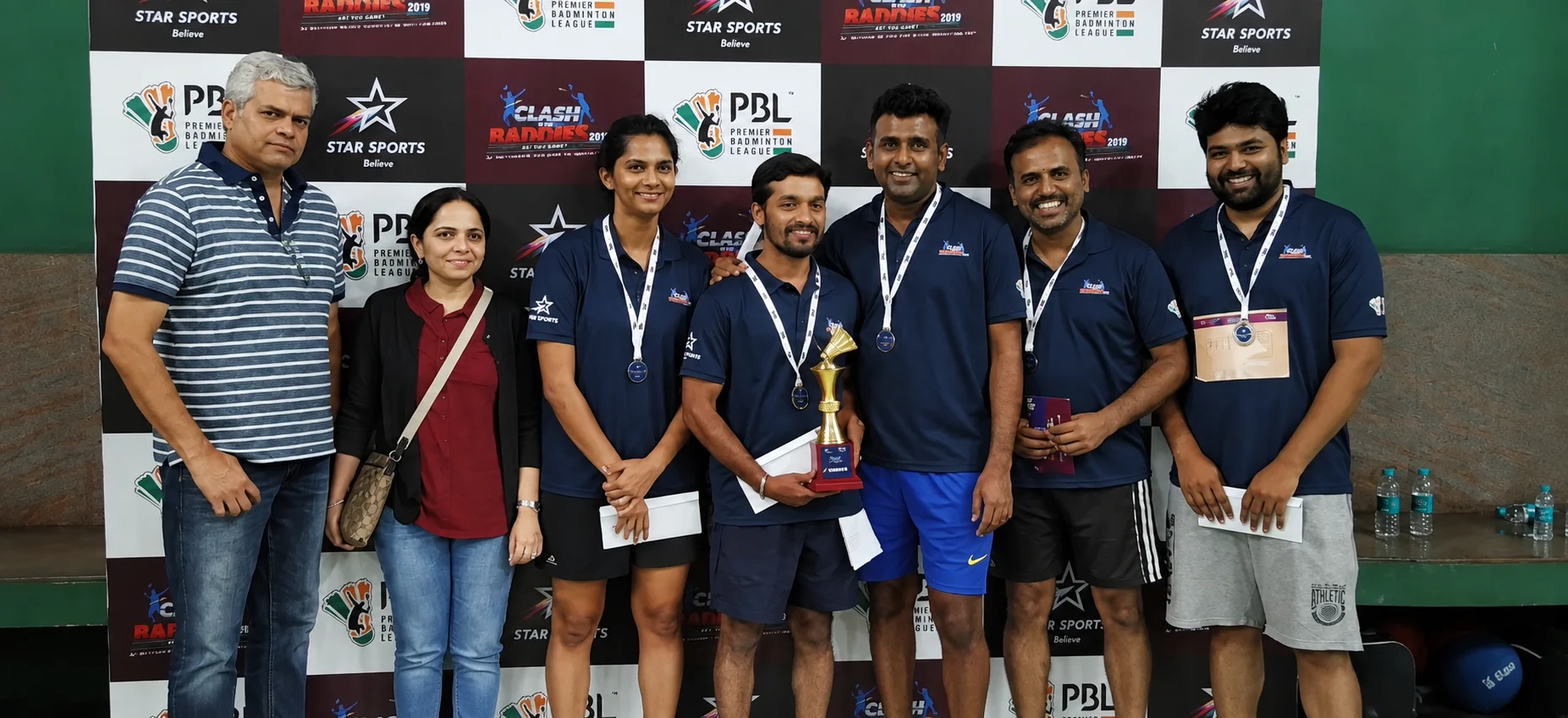 Clash of the Baddies 2019 winners with medals and the golden shuttle trophy