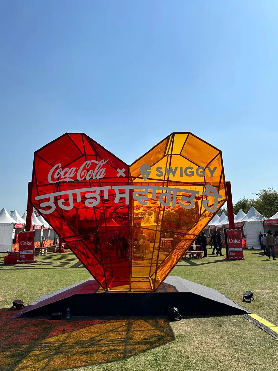 Coca-Cola × Swiggy heart-shaped installation at the Coke Is Cooking festival