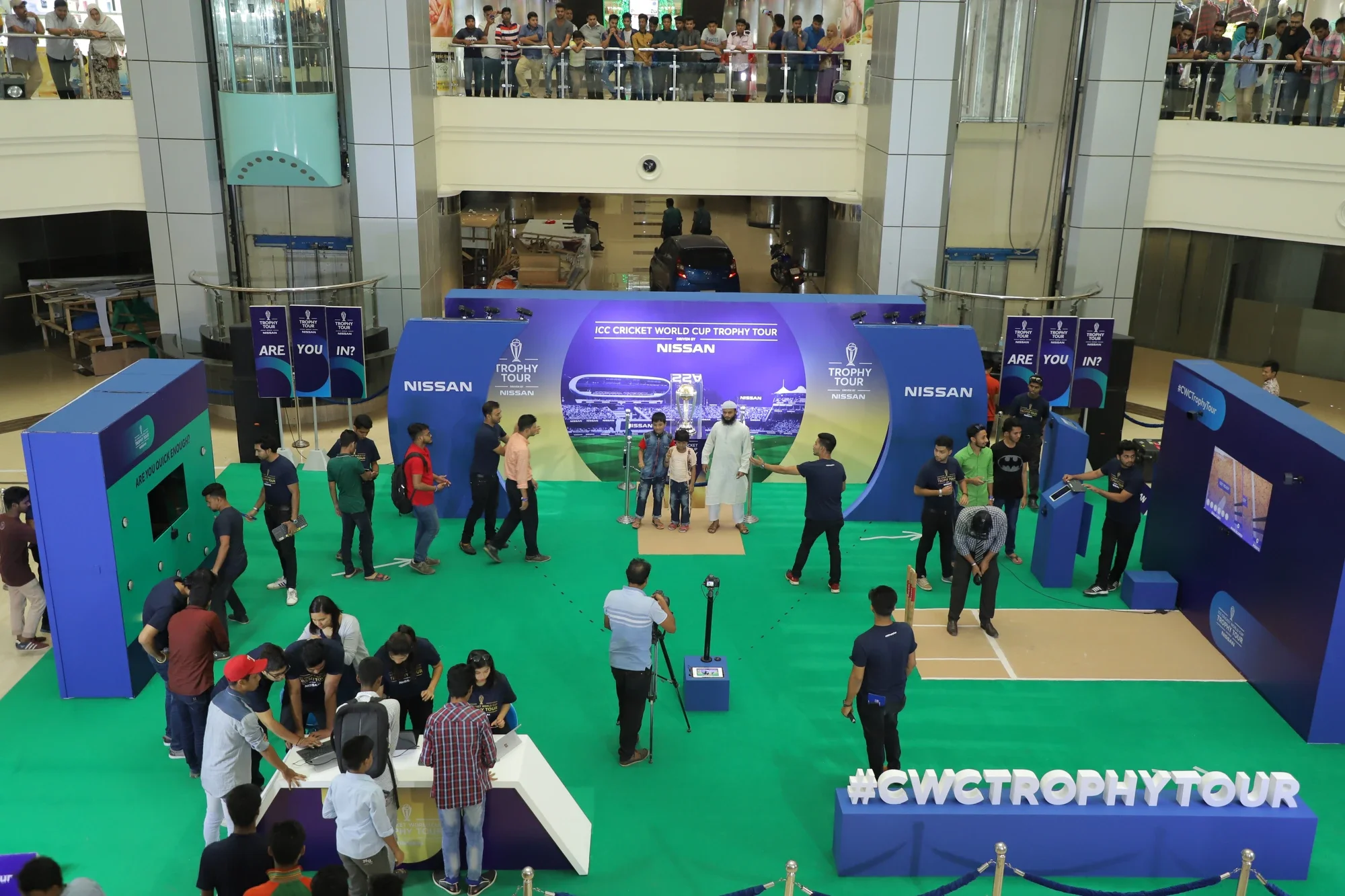 Aerial view of the Trophy Tour mall activation with games booths and branded backdrop