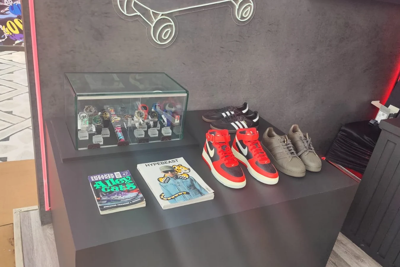 Watch and sneaker display case inside the G-SHOCK pavilion