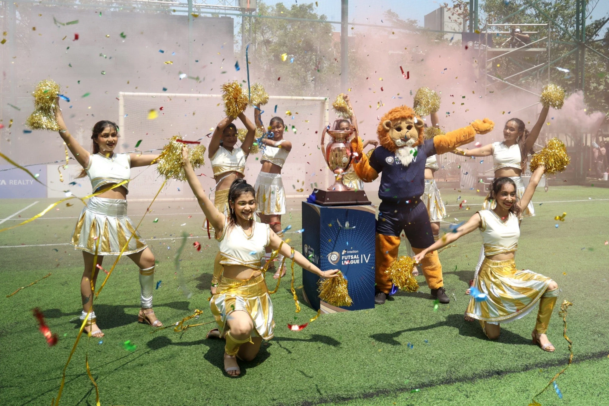 Leo the mascot with cheerleaders and confetti at the Season 4 opening ceremony