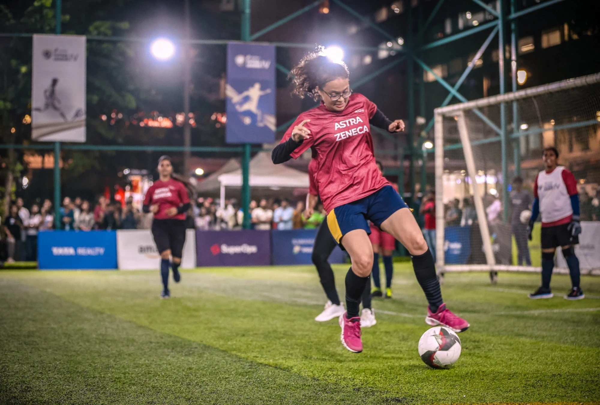 Women's league match under floodlights at Intellion Futsal League IV