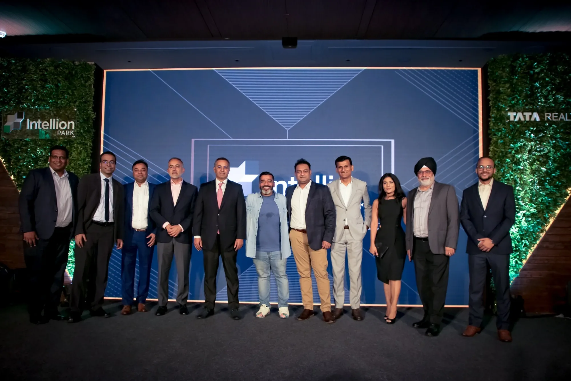 Intellion and Tata Realty leadership group photo on the IPC Networking Evening stage