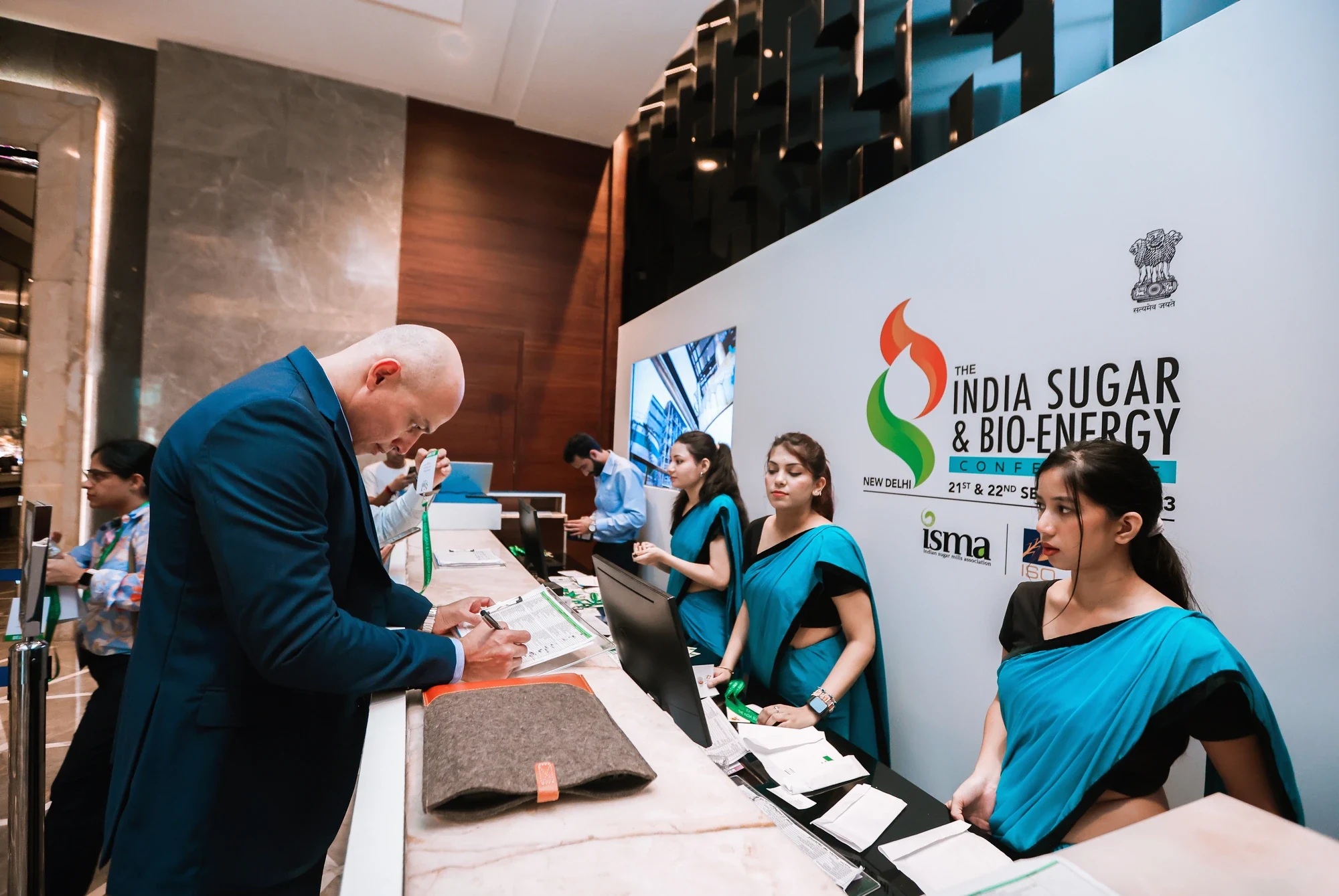 Delegates registering at the India Sugar & Bio-Energy Conference welcome desk