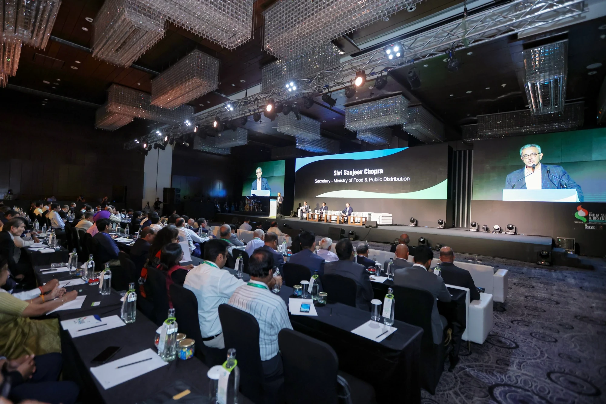 Wide view of the packed conference hall during the Secretary's address