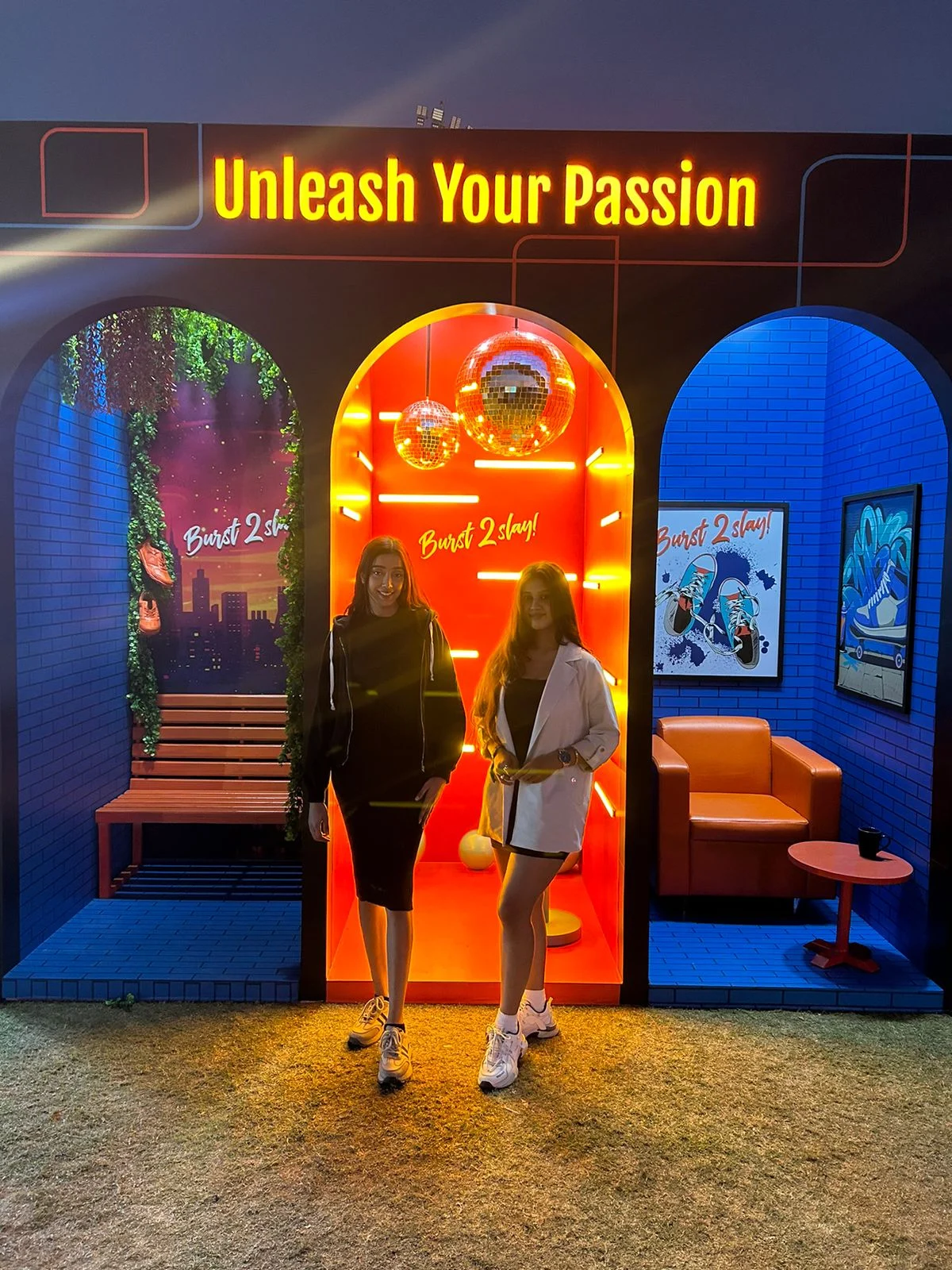 ITC Unleash Your Passion installation — neon arches and disco photo zones at the sneaker festival