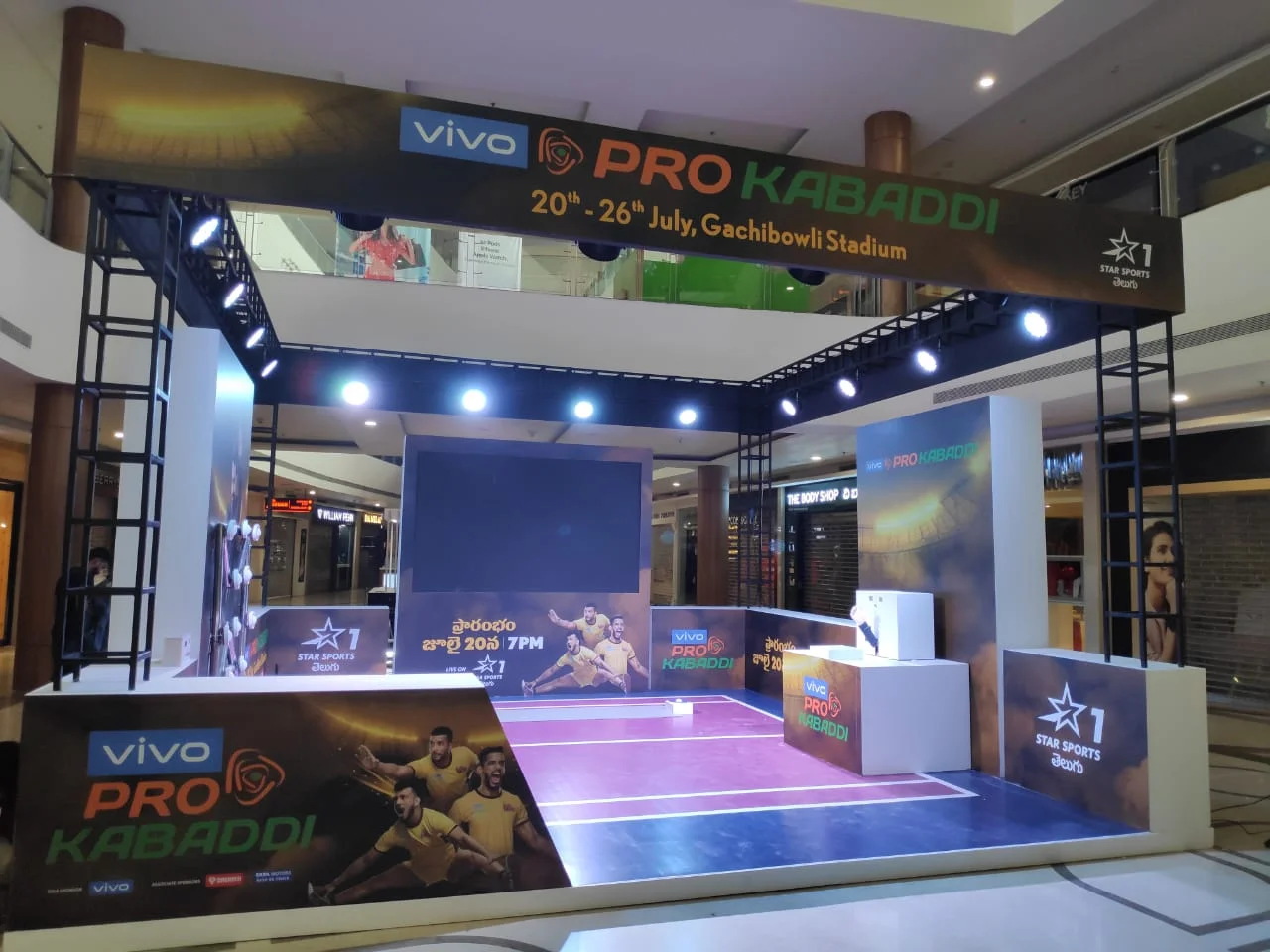 Full vivo Pro Kabaddi mall booth with pink and blue kabaddi court, Gachibowli Stadium branding