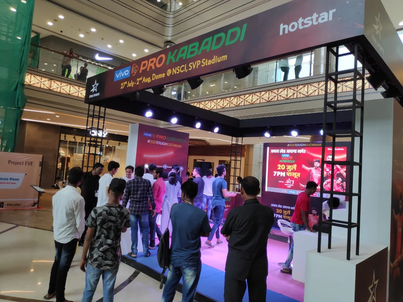 Crowd at the vivo Pro Kabaddi mall activation entrance under hotstar-branded trussing
