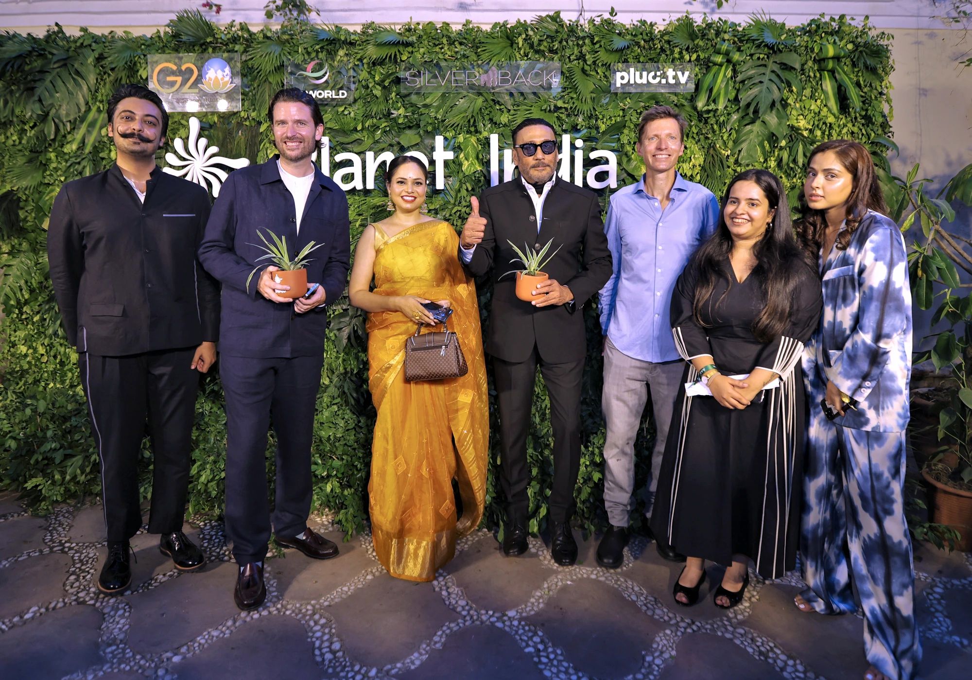 Guests at the Planet India G20 Cultural Evening green wall