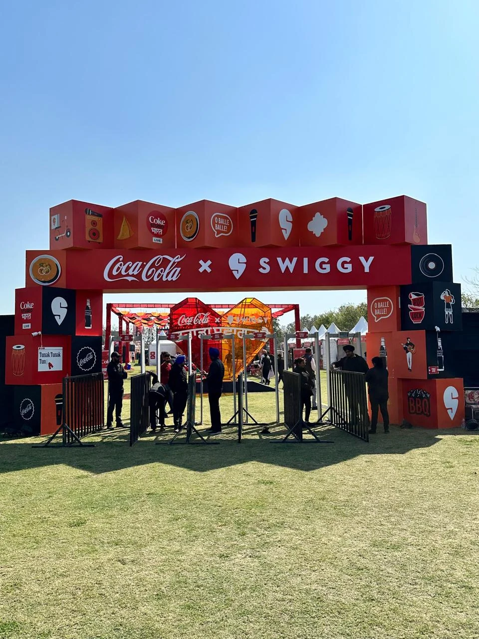 Coca-Cola × Swiggy entrance arch welcoming guests into the Coke Is Cooking festival
