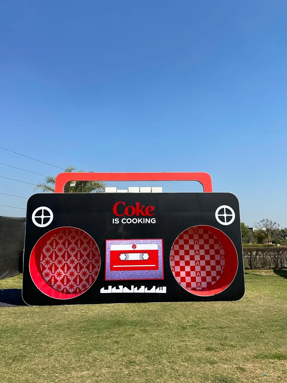 Coke Is Cooking giant boombox installation on the festival lawns