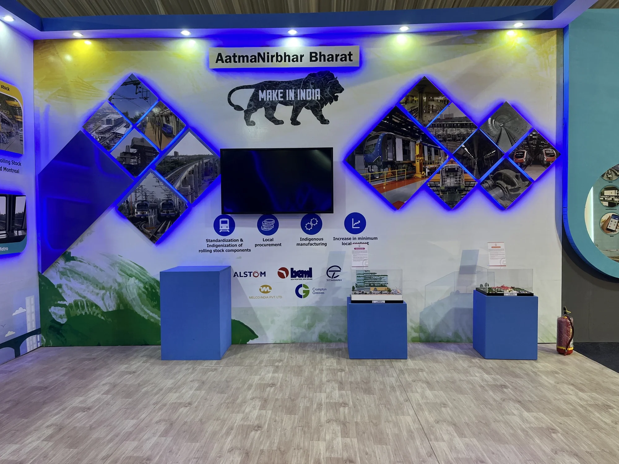 AatmaNirbhar Bharat Make in India wall with rolling stock displays and OEM partner logos